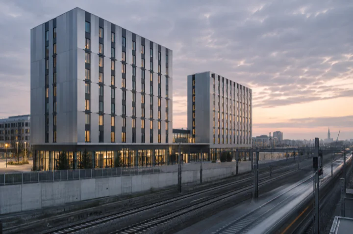 Editorial visualisation illustrating Moxy und Residence Inn Vienna East; not a documentary photograph